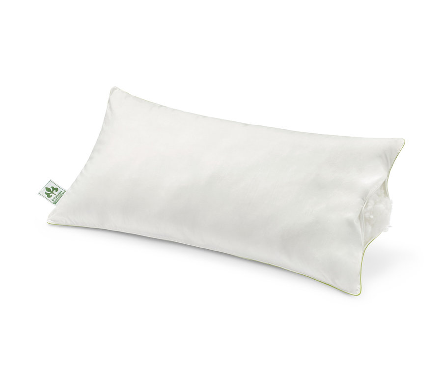 Un oreiller blanc irisette® greenline, env. 80 x 40 cm, posé sur un fond blanc.