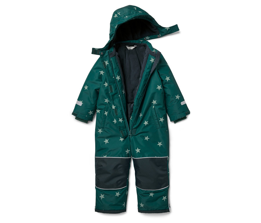 Combinaison de neige verte à motifs étoilés.