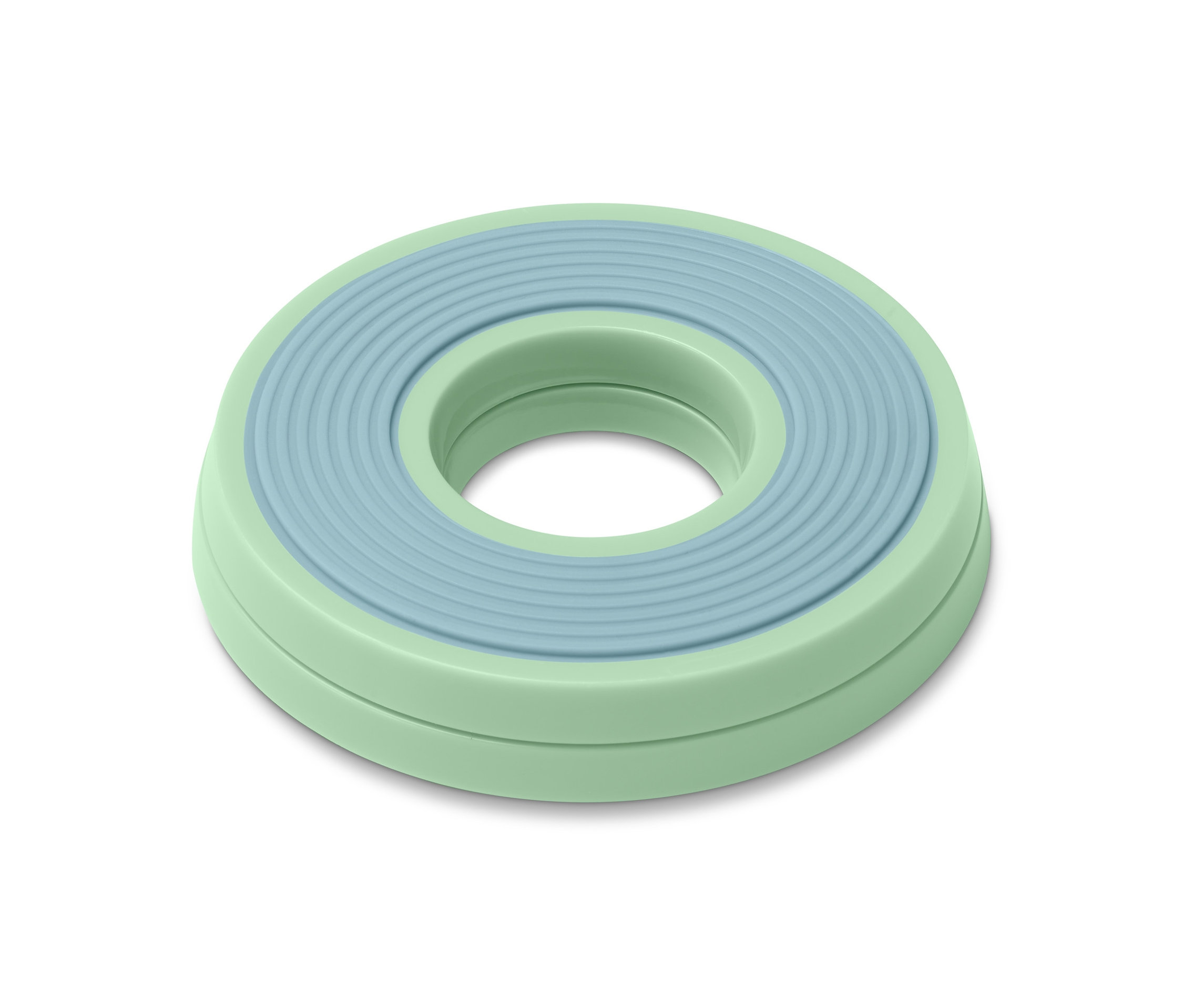 Une plaque tournante pour gâteaux verte.