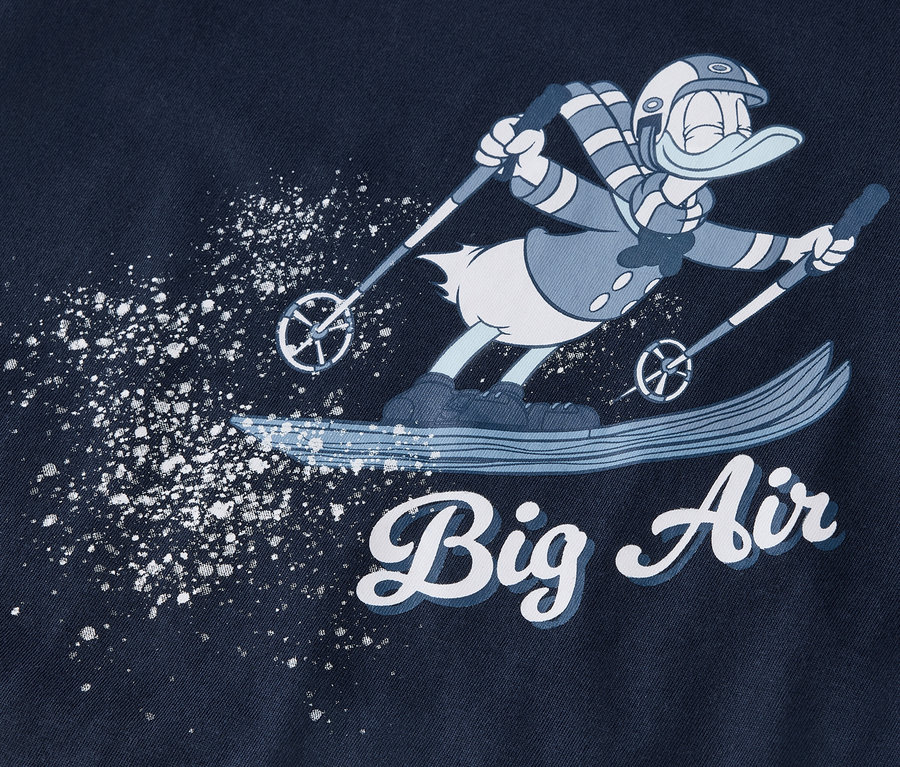 Un personnage de dessin animé fait du ski et projette de la neige, avec l'inscription "Big Air" en dessous.