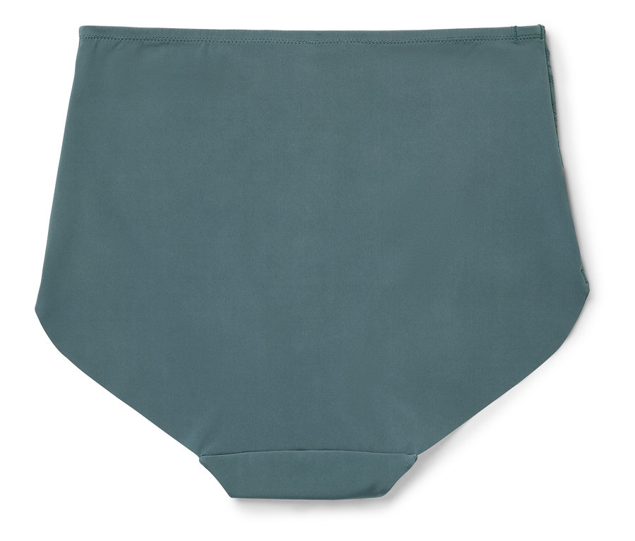 Gros plan d'un bas de maillot de bain turquoise pour femme sur un fond blanc.