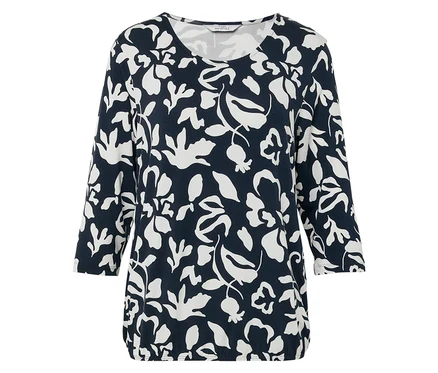 Haut à manches trois-quarts pour femme, bleu marine avec motifs floraux blancs.