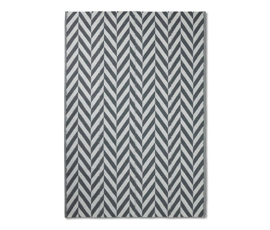 Tapis de tente fluorescent avec un motif à chevrons.