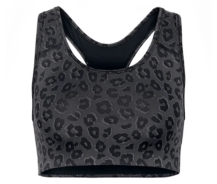 Gros plan d'une brassière de sport grise à motif animal.