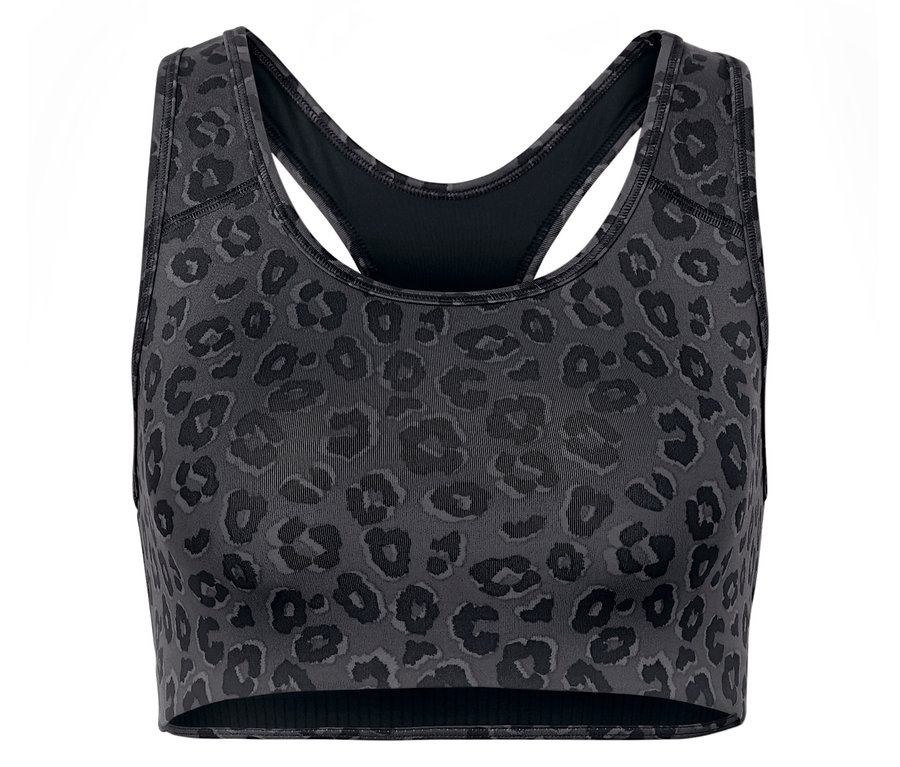 Gros plan d'une brassière de sport grise à motif animal.