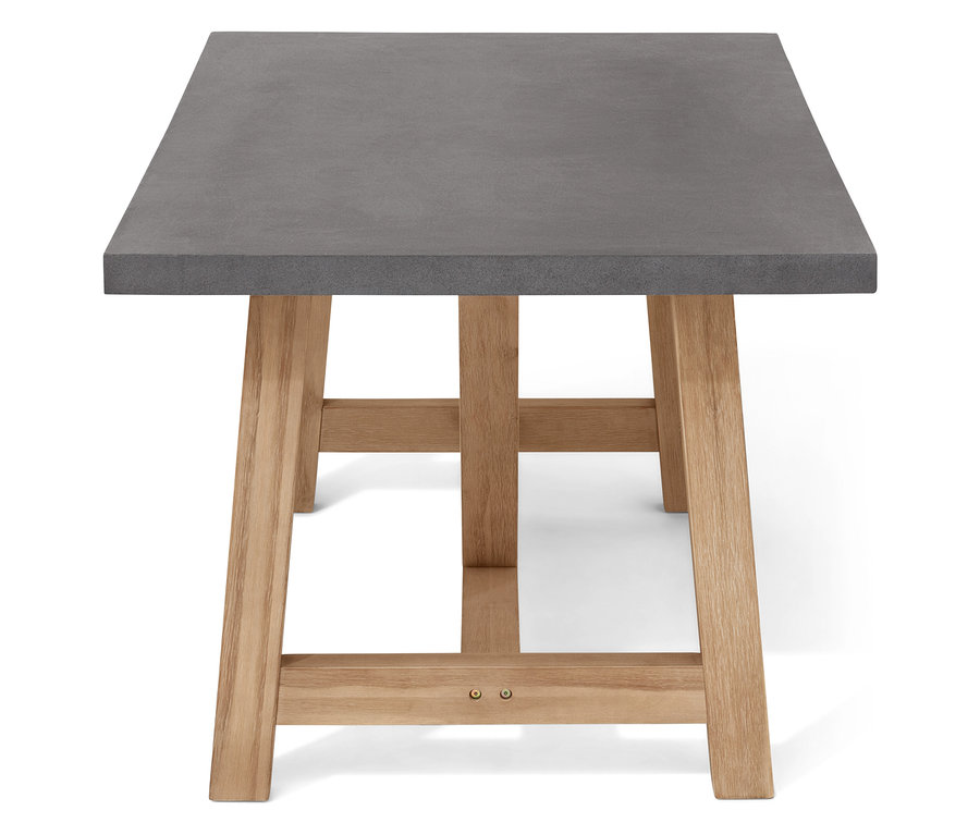 Vue détaillée d'une table grise avec des pieds en bois.