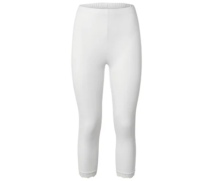 Legging blanc avec bordure en dentelle à l'ourlet.