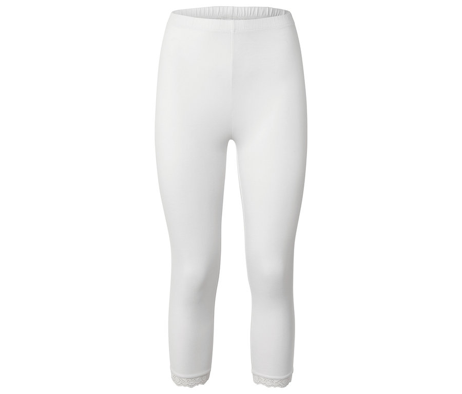 Legging blanc avec bordure en dentelle à l'ourlet.