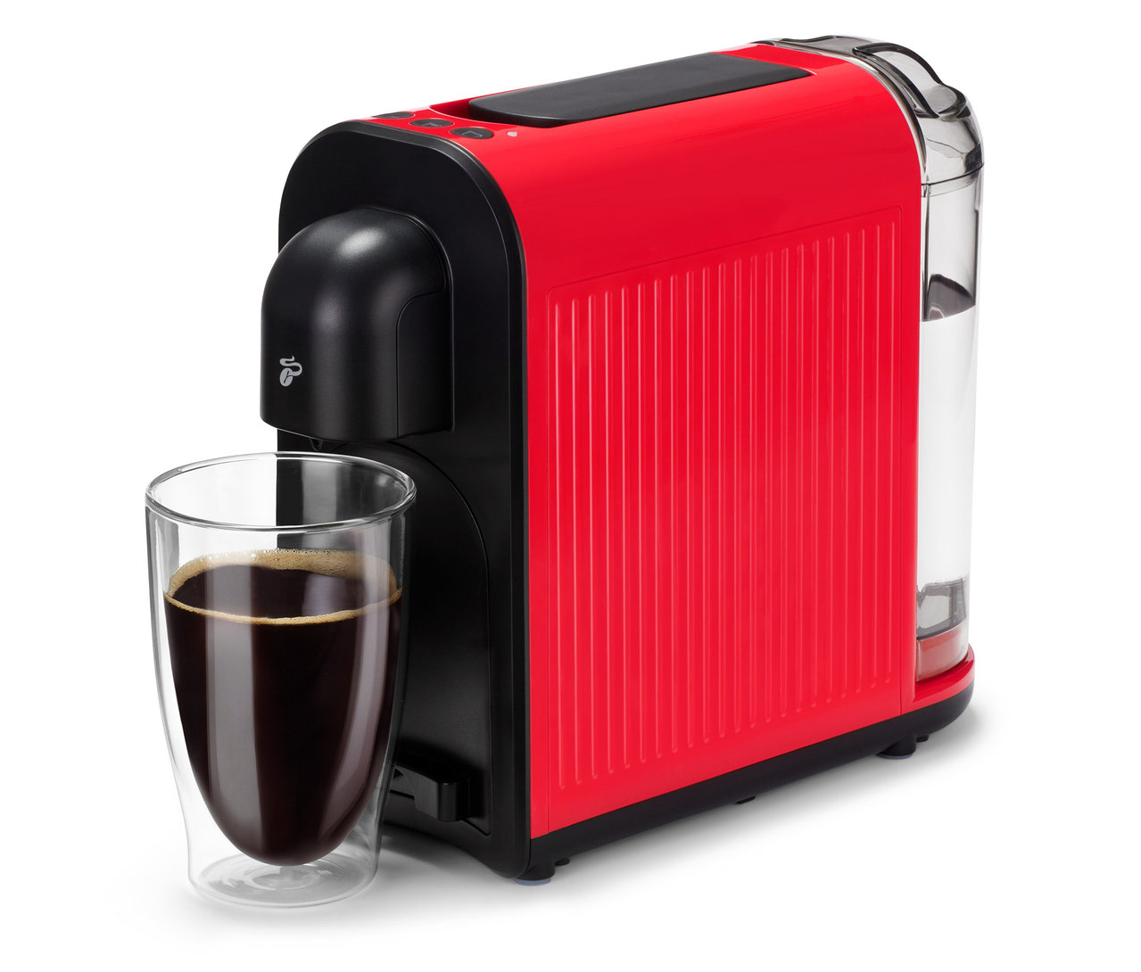 Une machine à café rouge Cafissimo now red est à côté d'un verre de café noir.