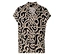 Une chemise à manches courtes avec un motif noir d'arabesques beiges.