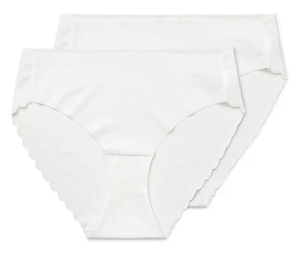 Deux slips Magic Cut blancs superposés.