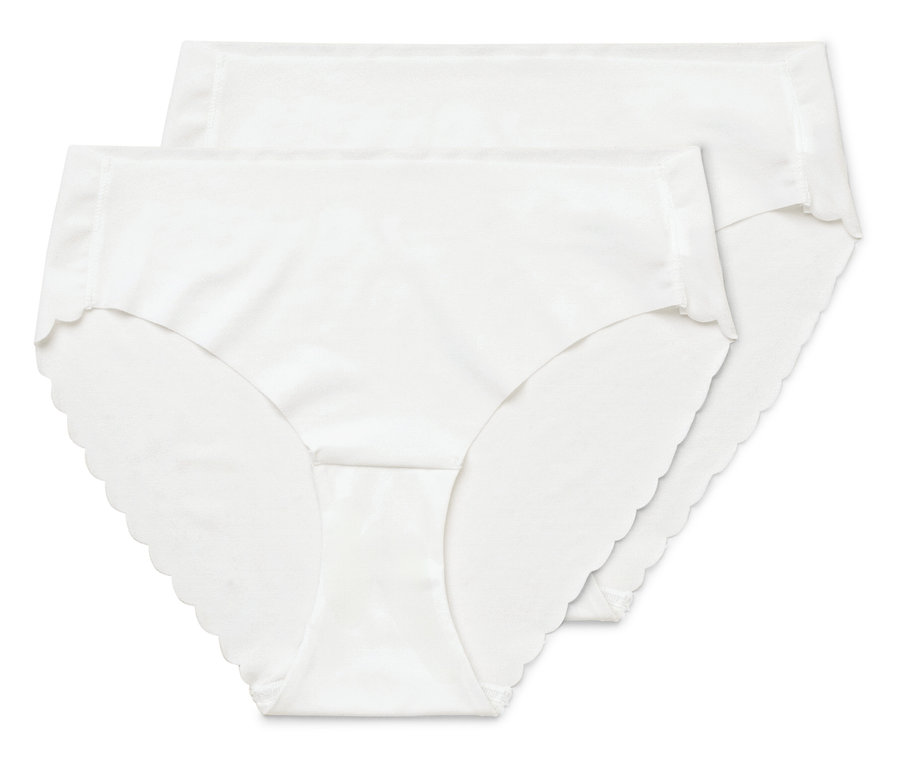 Deux slips Magic Cut blancs superposés.