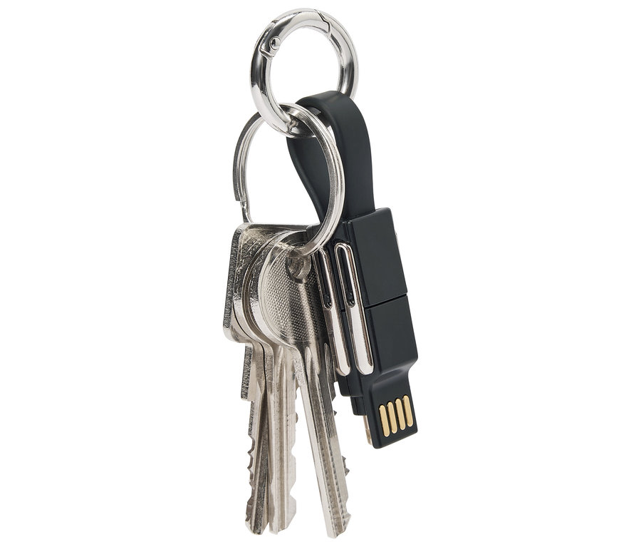 Porte-clés avec trois clés et une clé USB noire sur un anneau argenté.