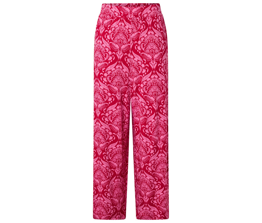 Pantalon rouge avec motif rose clair.
