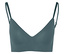 Gros plan d'un soutien-gorge turquoise à fines bretelles.