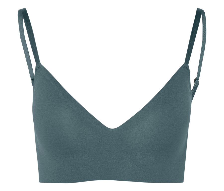 Gros plan d'un soutien-gorge turquoise à fines bretelles.