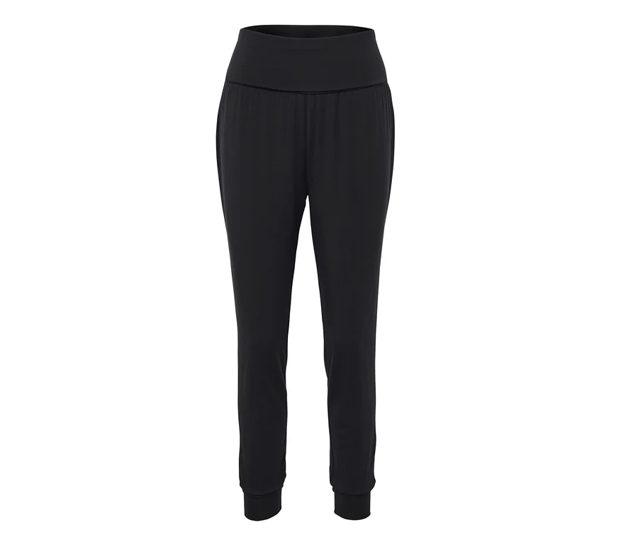 Pantalon de survêtement noir avec taille élastique et poignets.