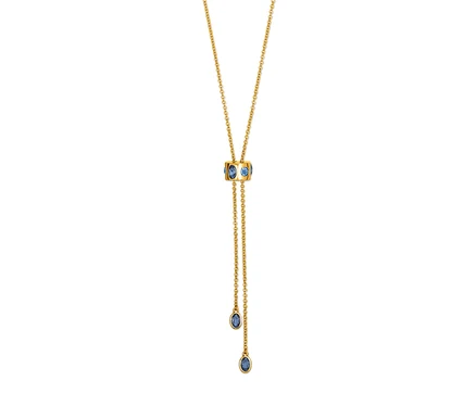 Collier en or avec des pierres bleues.