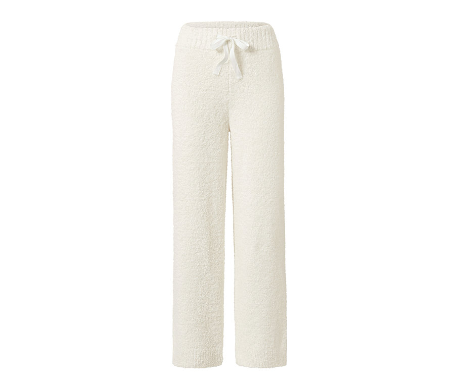 Un pantalon d’intérieur beige clair avec cordon de serrage.