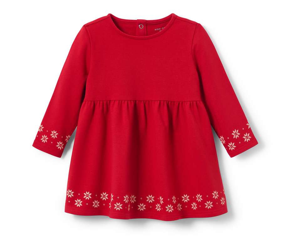Une robe en sweat rouge pour enfant avec des manches longues et des motifs de flocons de neige.