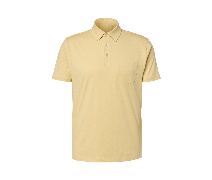 Polo en jersey jaune chiné avec boutons et poche.
