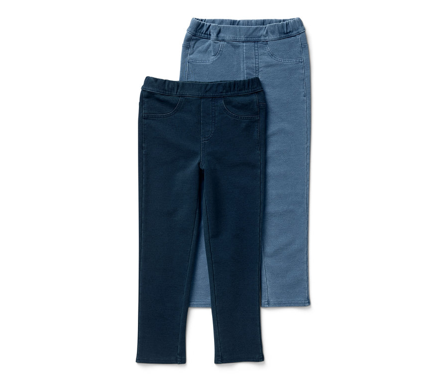 Deux jeggings pour enfant – Fit « Mia » bleu foncé et bleu clair superposés.