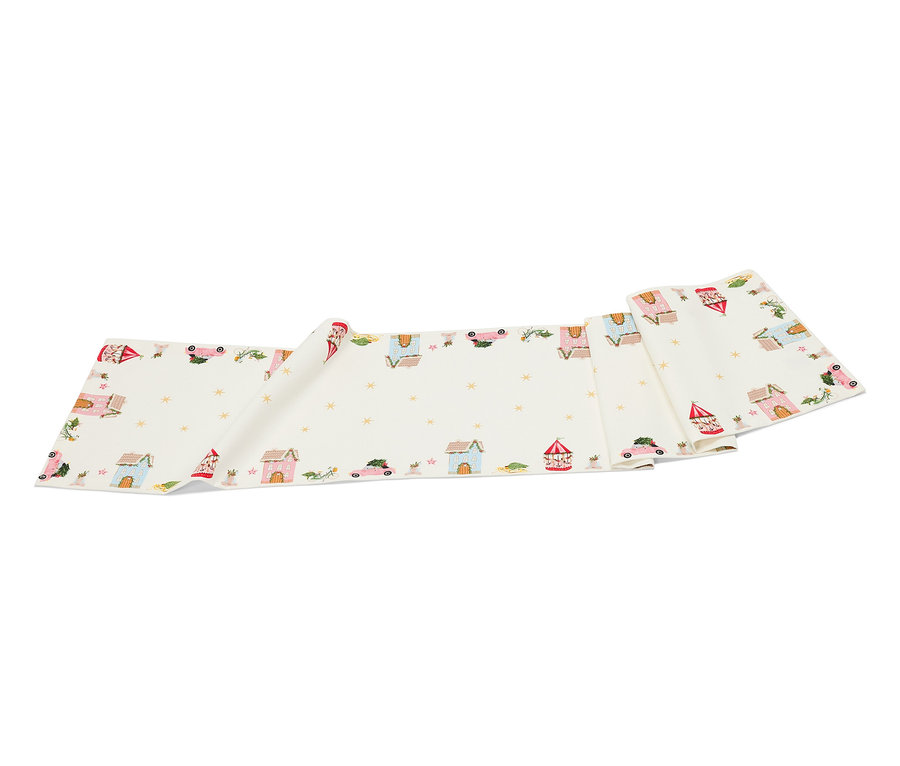 Une bande de tissu blanche avec des maisons, des voitures et des étoiles dessinées.