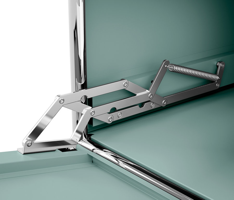 Détail du mécanisme d'ouverture d'une boîte verte.