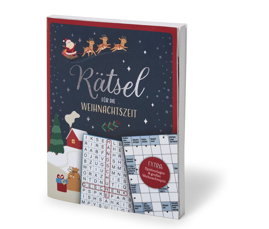 Un livre sur le thème de Noël, la couverture représente le Père Noël avec des rennes et un mots croisés.