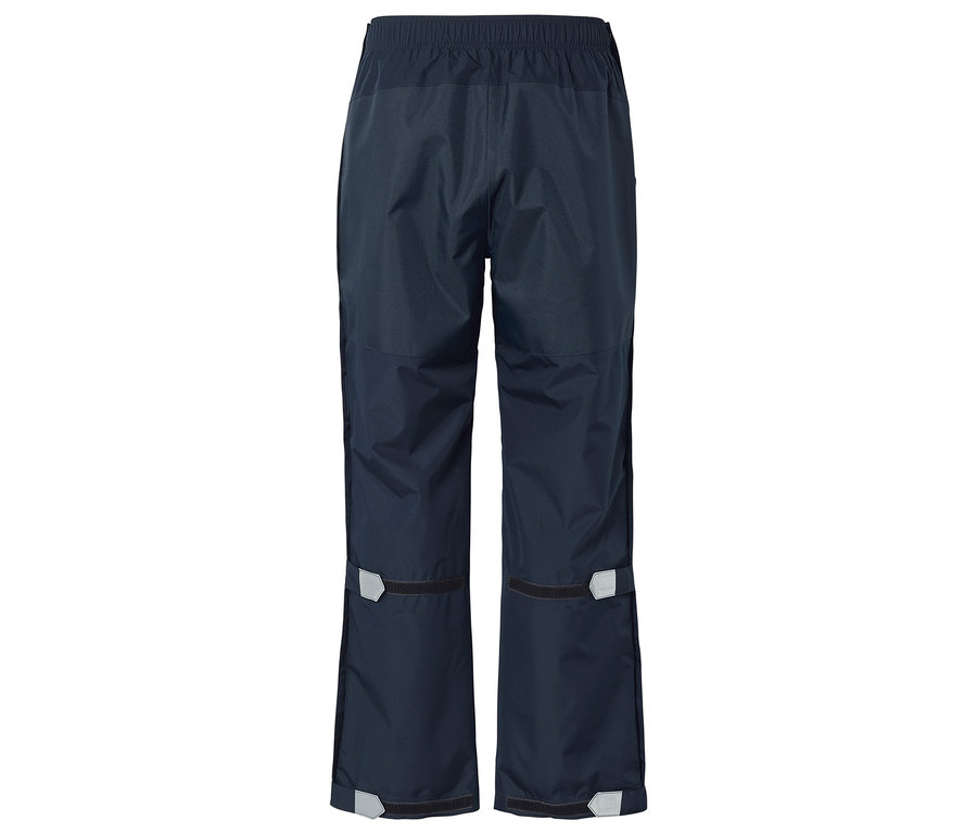 Pantalon de pluie bleu marine avec élastique et détails réfléchissants au bas des jambes.