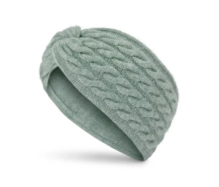 Bandeau tricoté vert clair avec un nœud.