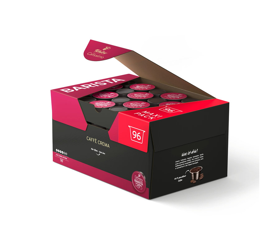Boîte ouverte noire et magenta contenant 96 capsules de café Tchibo Cafissimo Caffè Crema.