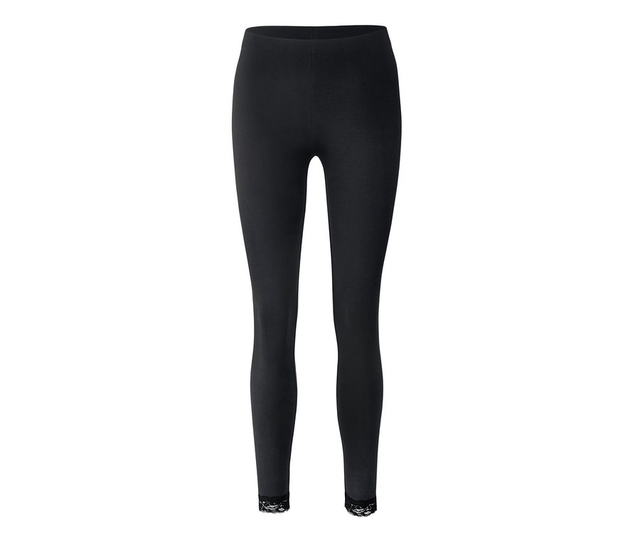 Legging noir avec détails en dentelle aux chevilles.