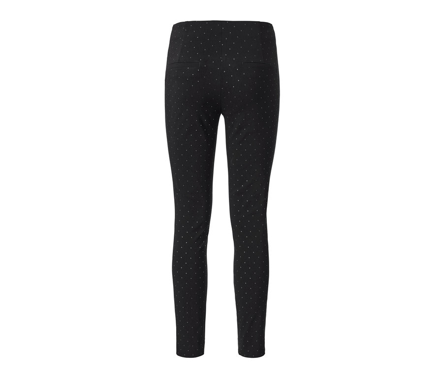 Pantalon stretch à pois noir.