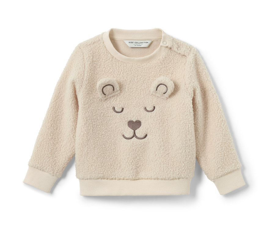 Sweatshirt nounours pour enfant avec un visage d'ours.