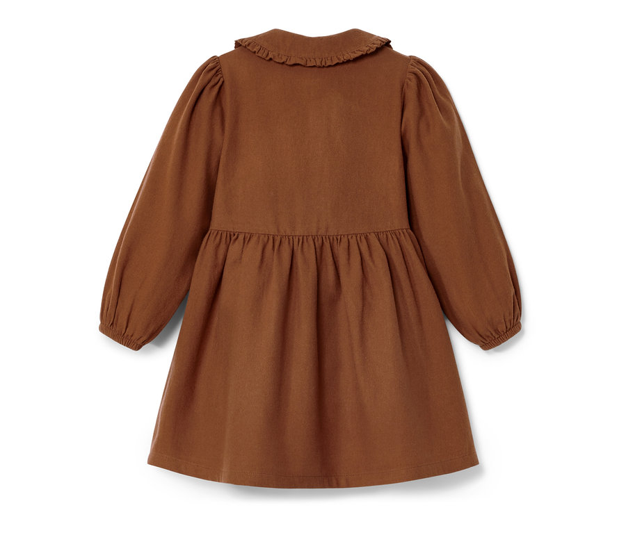 Vue détaillée d'une robe tissée couleur cognac pour tout-petit avec des manches longues et un col à froufrous.