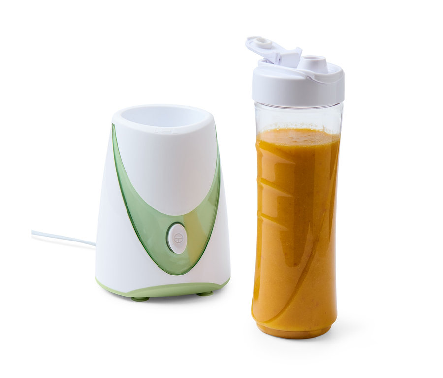 Machine à smoothies, 250 W, avec un récipient rempli de smoothie orange.