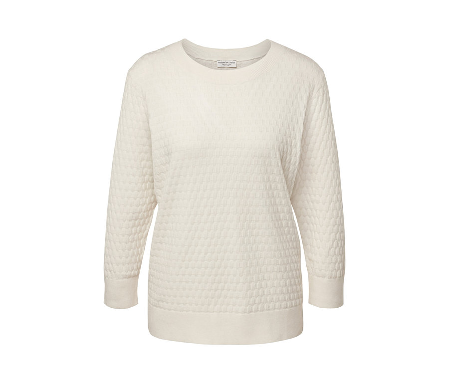 Pull-over en maille structurée de couleur crème.