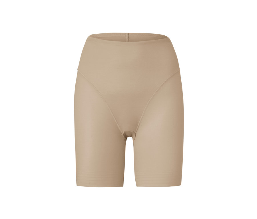 Un short effet modelant couleur chair sur fond blanc.