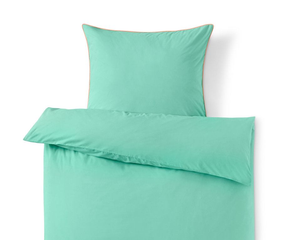 Parure de lit en renforcé turquoise de taille standard avec oreiller.