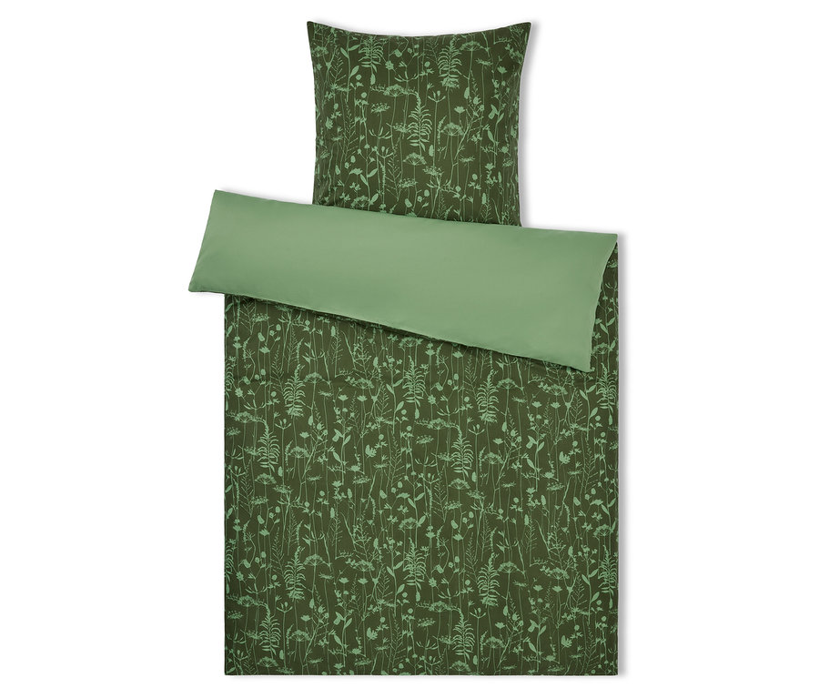 Linge de lit vert avec motif floral et bordure verte.