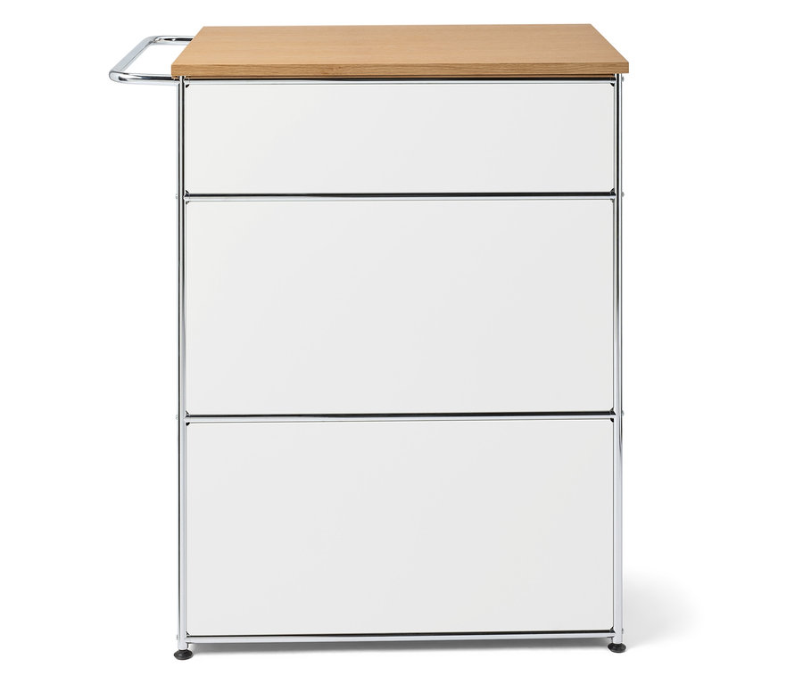 Unité de rangement blanche avec trois tiroirs et un plateau en bois clair.