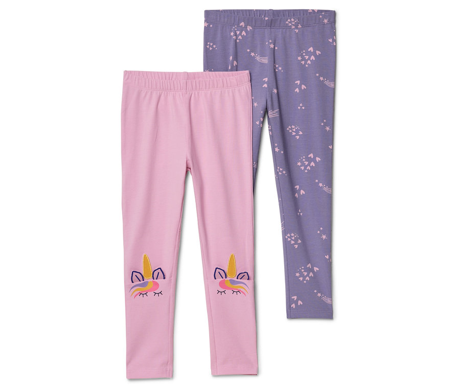 Legging rose avec motif de licorne à côté d'un legging violet à motif d'étoiles.