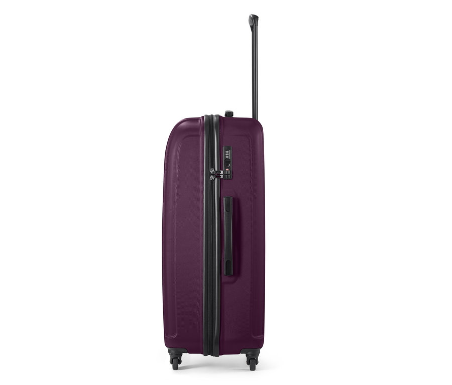 Valise rigide violette de grande taille avec poignée extensible.