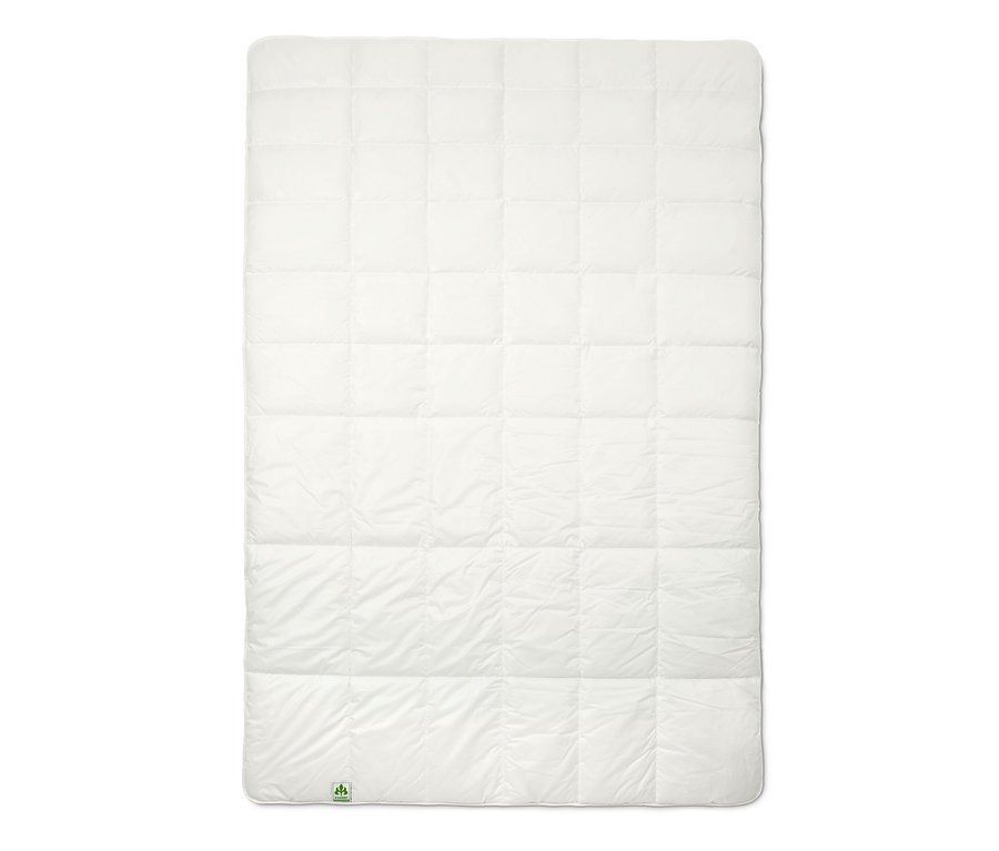 Une couette thermique blanche irisette® greenline avec un motif carré.