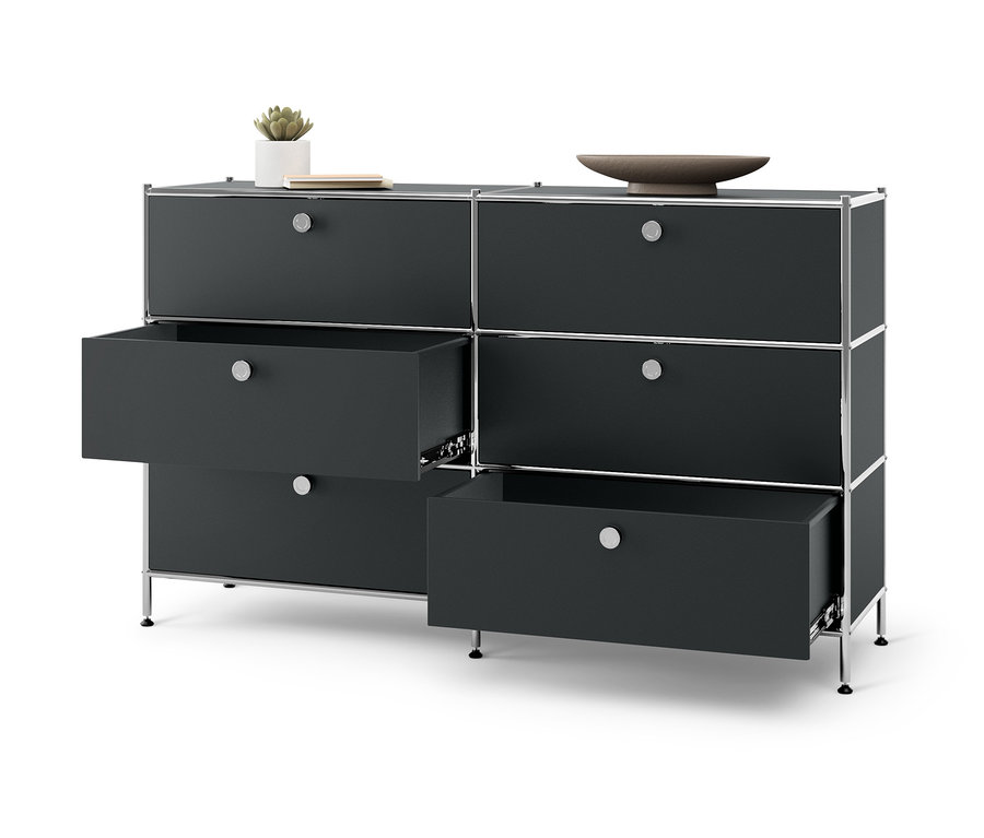 Commode en métal « CN3 » noire avec 6 tiroirs, dont deux sont ouverts.