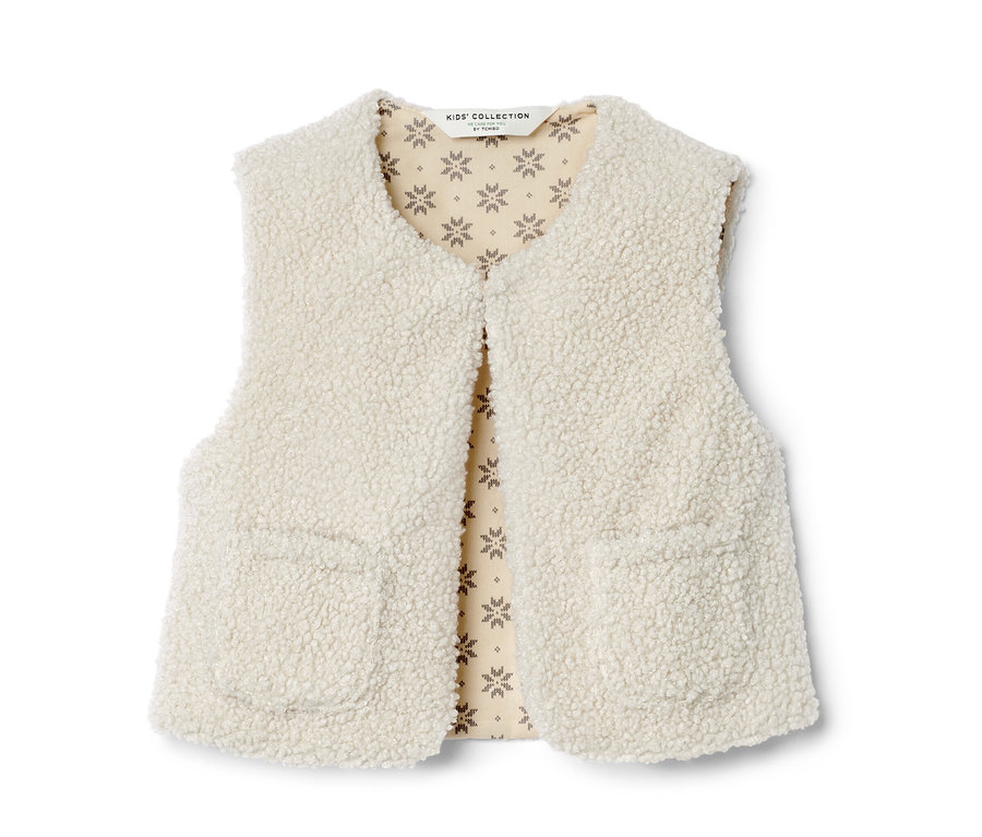 Gilet sans manches enfant en polaire teddy couleur crème avec poches.