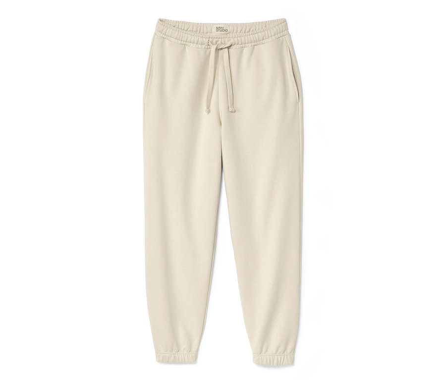 Un pantalon de jogging NAH/STUDIO écru en coton durable.