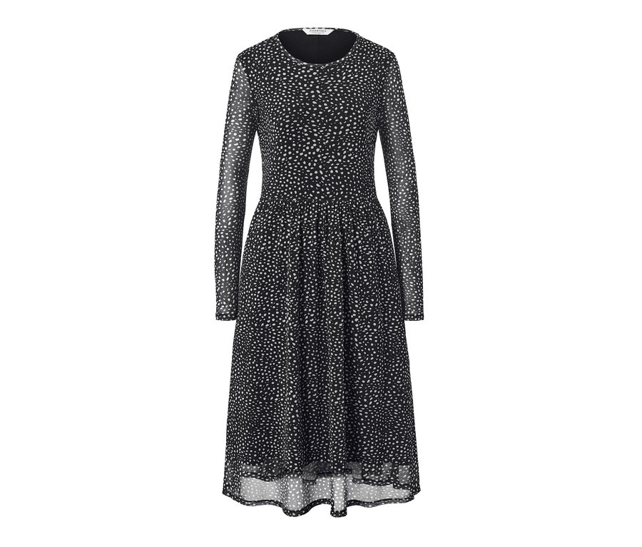 Robe noire en mesh à pois avec manches longues.
