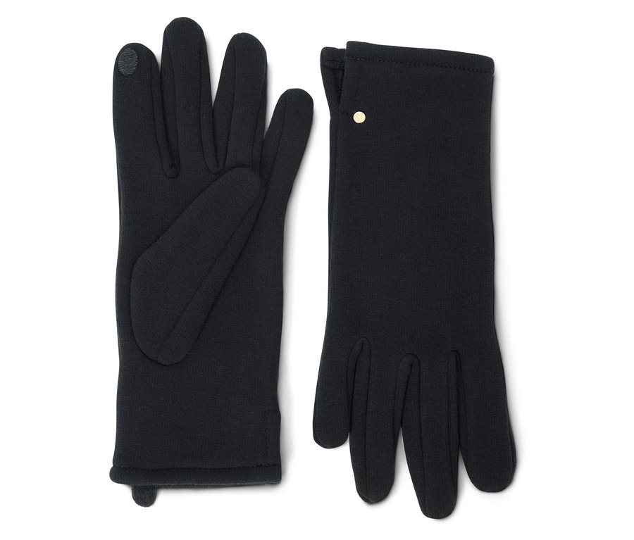Deux gants noirs sont posés côte à côte.